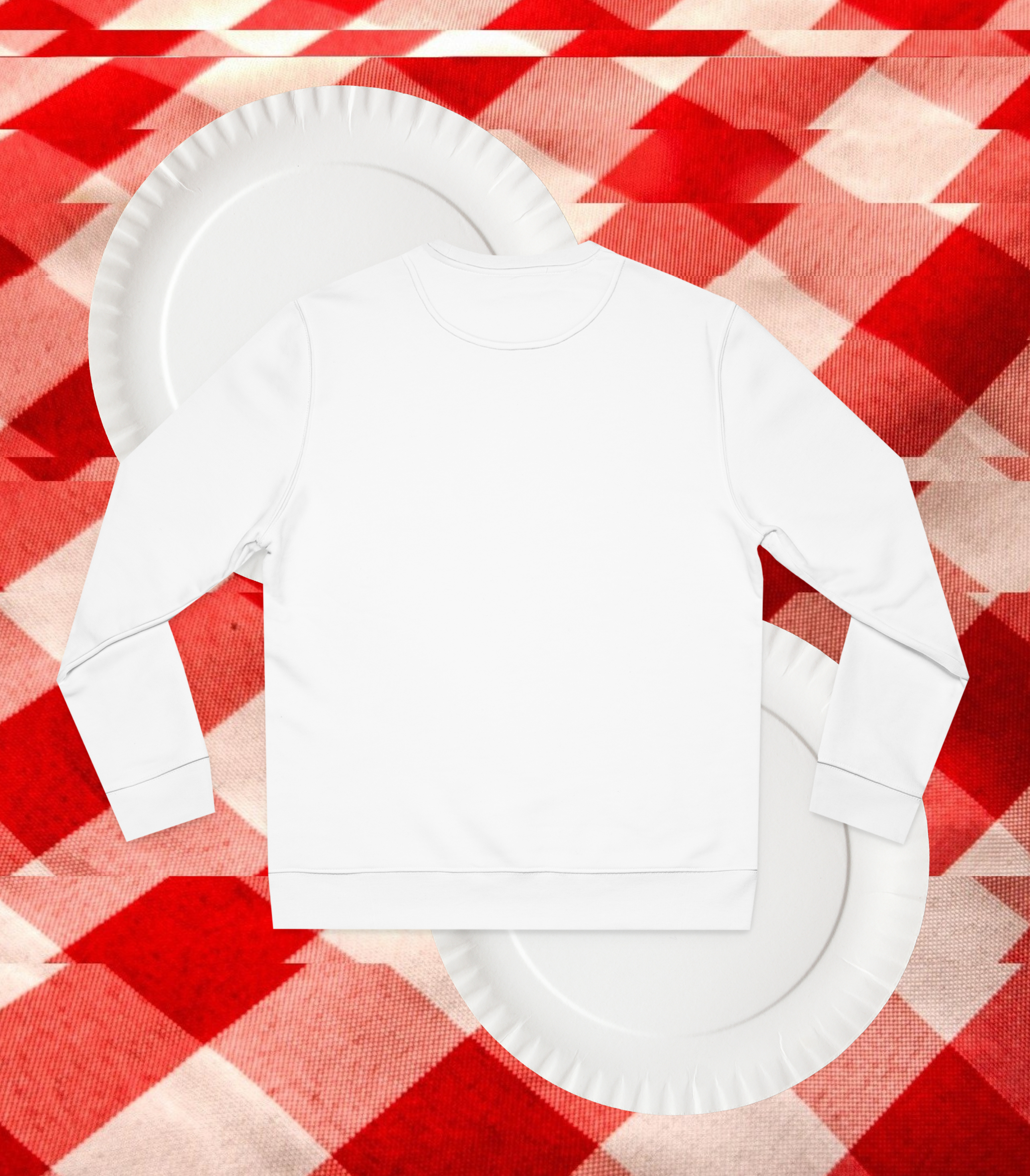 Back view of a White sweatshirt on top of white paper plates against a red and white checkered tablecloth.